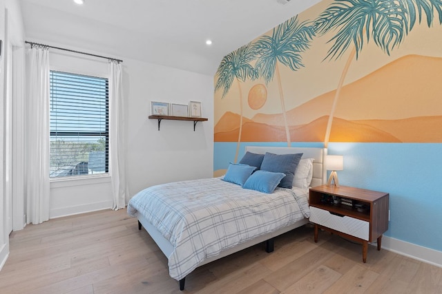 bedroom featuring recessed lighting, baseboards, and wood finished floors