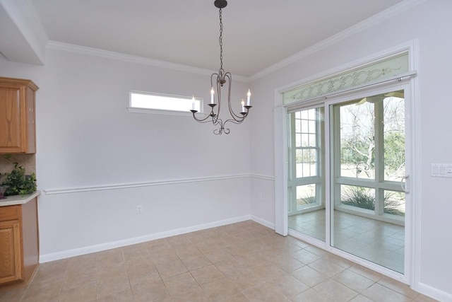 unfurnished dining area featuring an inviting chandelier, baseboards, crown molding, and light tile patterned flooring