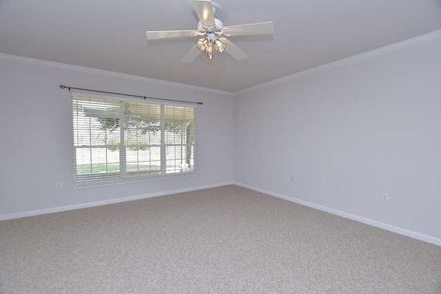 unfurnished room featuring baseboards and crown molding