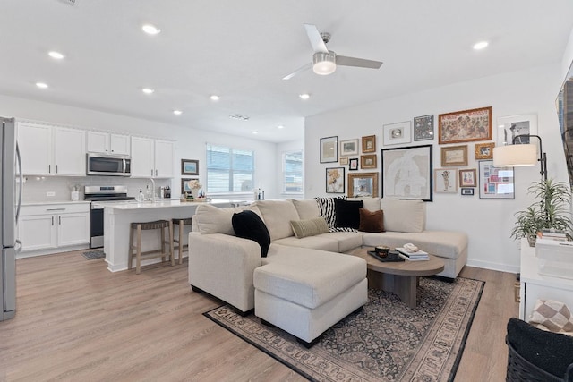 457 Agave Azul Way, Leander, TX 78641 - living area with ceiling fan, light wood-type flooring, and recessed lighting