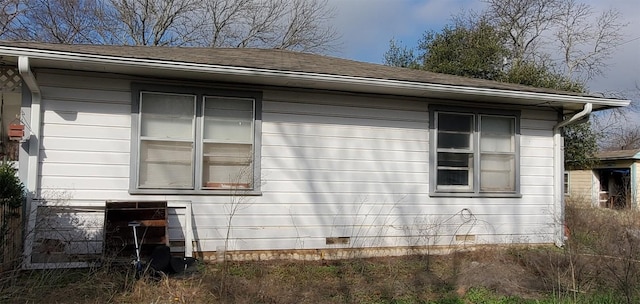 view of property exterior featuring crawl space