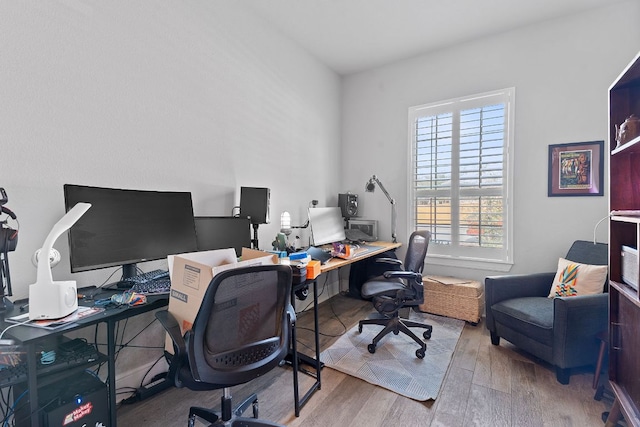 office area with wood finished floors