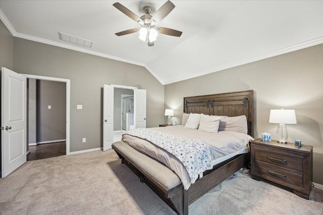 bedroom with ornamental molding, carpet, visible vents, and vaulted ceiling