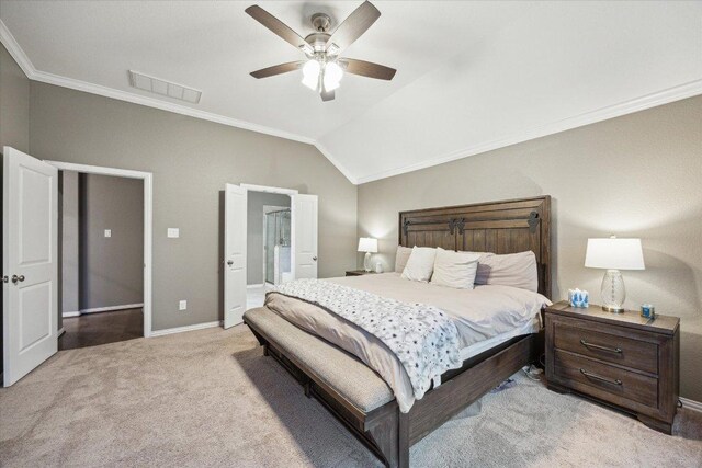 6618 Tiger Trl, Katy, TX 77493 - bedroom featuring ornamental molding, carpet, vaulted ceiling, a ceiling fan, and ensuite bath