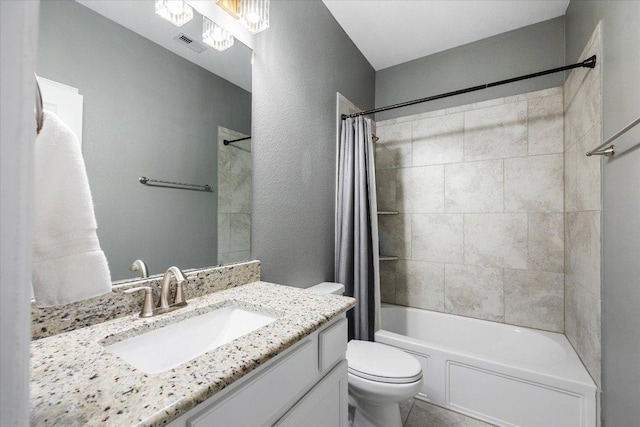 bathroom featuring visible vents, a textured wall, toilet, shower / bath combination with curtain, and vanity