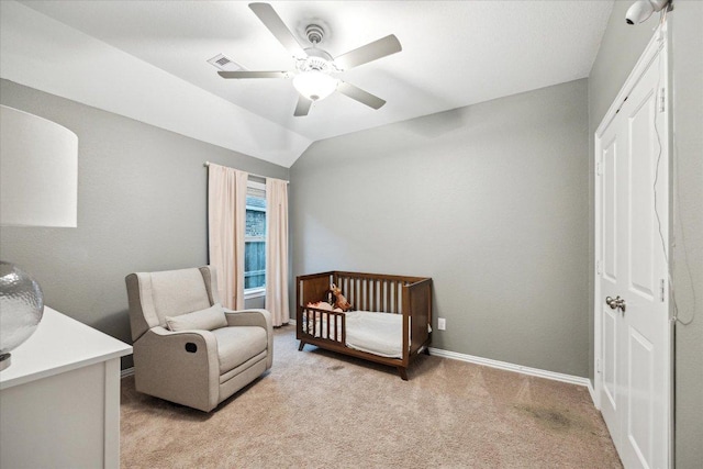 6618 Tiger Trl, Katy, TX 77493 - bedroom featuring light carpet, baseboards, a nursery area, a ceiling fan, and lofted ceiling
