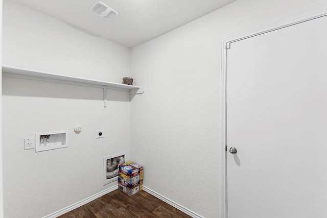 laundry area with visible vents, dark wood-type flooring, gas dryer hookup, electric dryer hookup, and laundry area