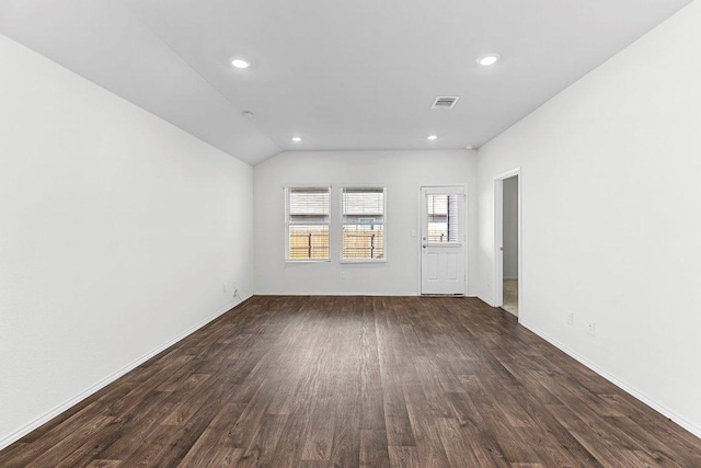 unfurnished living room with baseboards, wood finished floors, visible vents, and recessed lighting