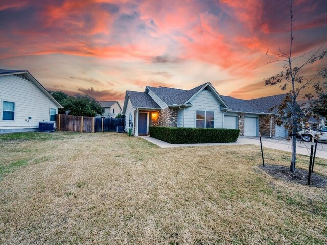 1011 Janae Ct, Georgetown, TX 78626 - single story home featuring central AC, an attached garage, driveway, and a shingled roof