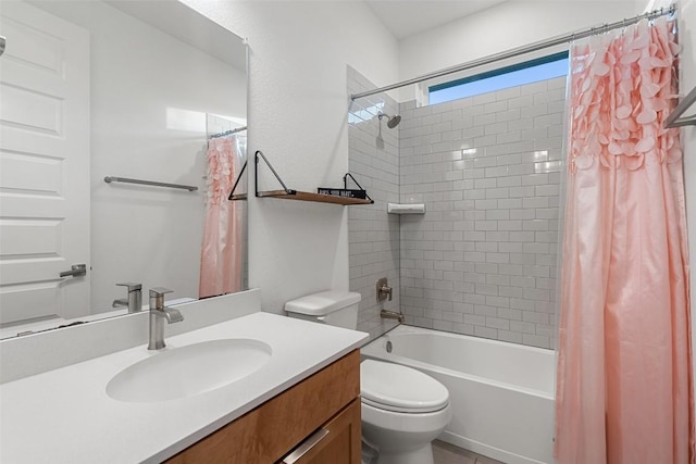 full bathroom featuring toilet, shower / bathtub combination with curtain, and vanity