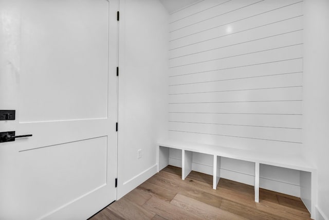 mudroom with wood finished floors