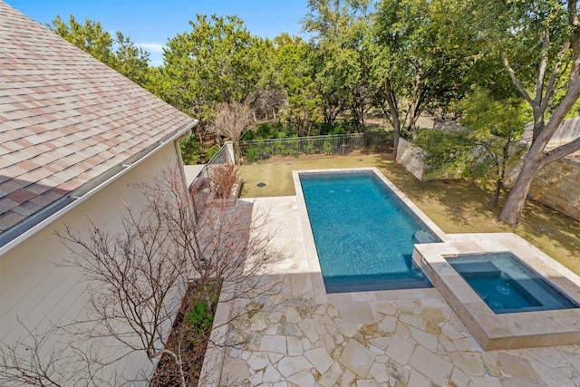 view of pool featuring a fenced in pool, a patio area, a fenced backyard, and an in ground hot tub