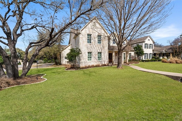 625 Robin Dale Ct, Lakeway, TX 78734 - view of front of house with a front yard and stone siding