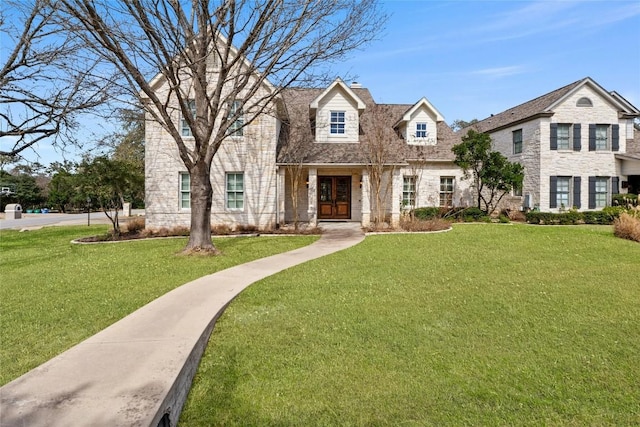 625 Robin Dale Ct, Lakeway, TX 78734 - view of front of house featuring french doors, a front yard, and stone siding