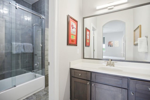 full bath featuring enclosed tub / shower combo and vanity