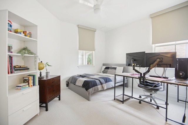 bedroom with light carpet