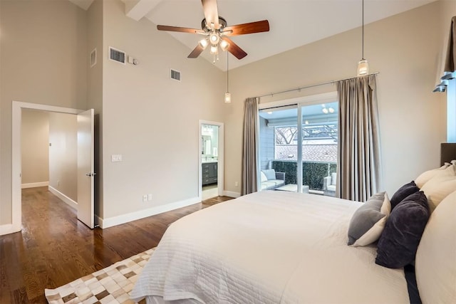 bedroom featuring high vaulted ceiling, wood finished floors, visible vents, and baseboards