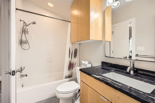 bathroom with shower / bathtub combination with curtain, toilet, and vanity