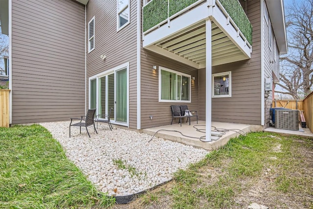 back of house with a patio, cooling unit, and fence