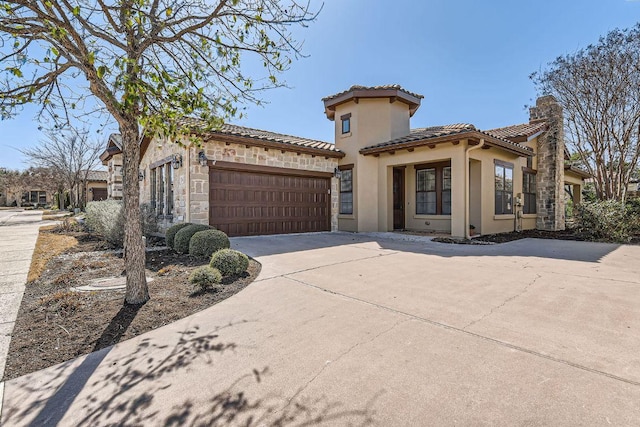 304 Belforte Ave, Austin, TX 78734 - mediterranean / spanish home featuring stucco siding, concrete driveway, a garage, a chimney, and a tile roof