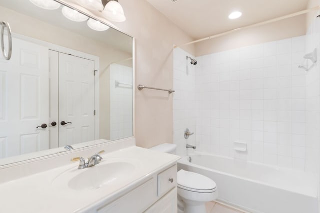 bathroom featuring shower / washtub combination, recessed lighting, toilet, vanity, and tile patterned flooring