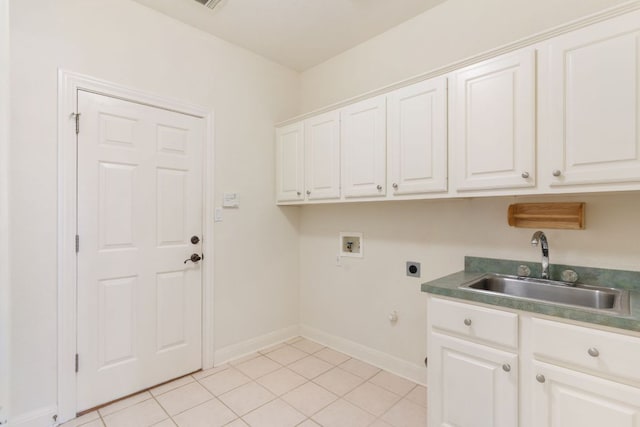 laundry room featuring washer hookup, a sink, baseboards, cabinet space, and electric dryer hookup