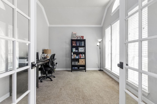 home office with carpet floors, baseboards, vaulted ceiling, and french doors