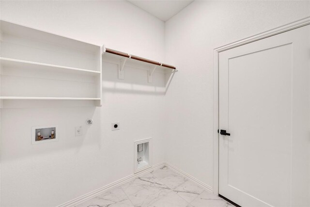 148 Rocky View Ln, Georgetown, TX 78628 - washroom featuring light marble finish floors, electric dryer hookup, gas dryer hookup, and washer hookup