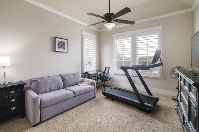 exercise room with ceiling fan, ornamental molding, light colored carpet, and baseboards