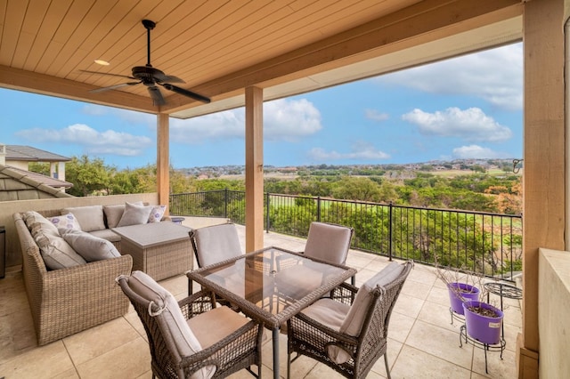 view of patio featuring outdoor lounge area and ceiling fan