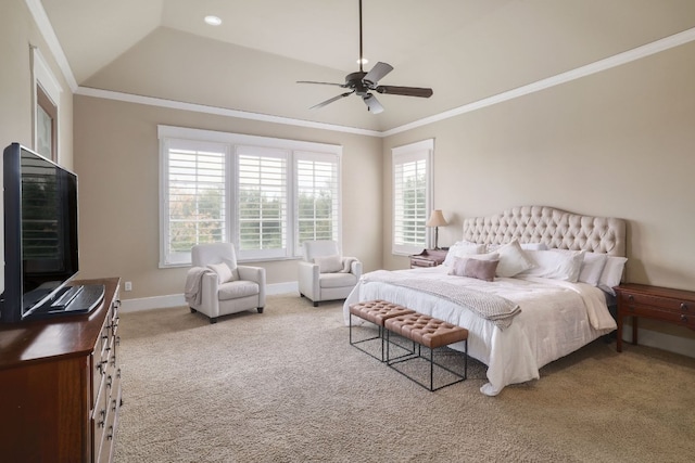 carpeted bedroom featuring a ceiling fan, vaulted ceiling, crown molding, and baseboards