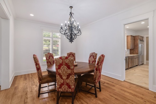 dining room with baseboards, a chandelier, light wood-style floors, ornamental molding, and recessed lighting