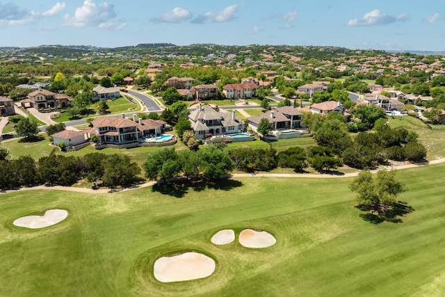 bird's eye view featuring view of golf course and a residential view