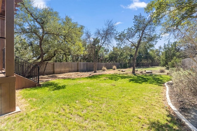 view of yard featuring a fenced backyard