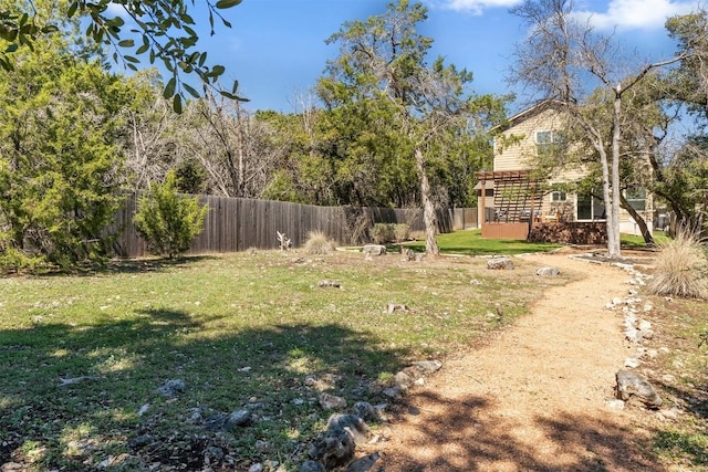 view of yard with fence