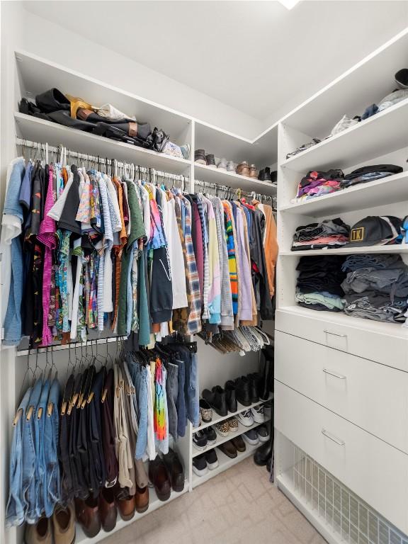 spacious closet featuring tile patterned floors