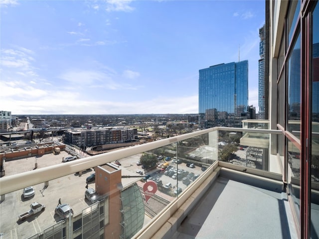 balcony featuring a city view