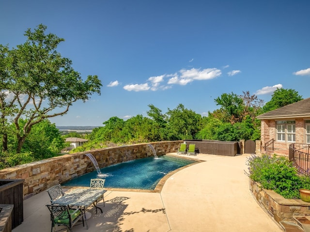 outdoor pool featuring a patio area