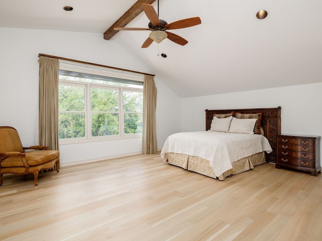 bedroom with a ceiling fan, light wood-type flooring, and lofted ceiling with beams