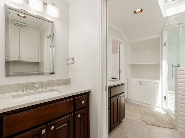 full bath featuring recessed lighting, a shower stall, ornamental molding, and vanity