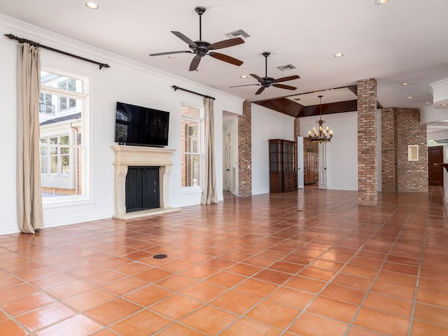 unfurnished living room featuring ornamental molding, visible vents, a fireplace with raised hearth, and light tile patterned flooring