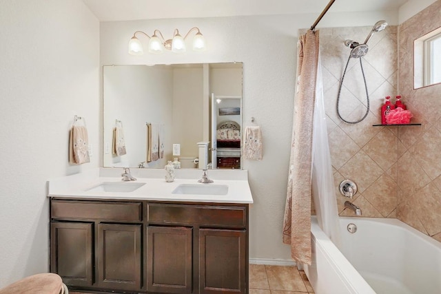 bathroom featuring shower / tub combo, tile patterned flooring, a sink, and double vanity