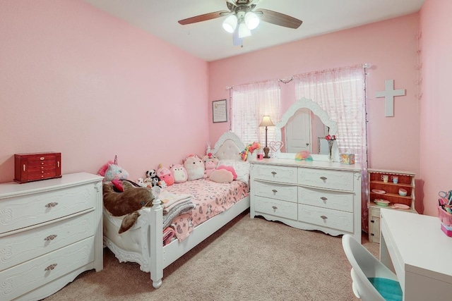 bedroom with ceiling fan and light colored carpet