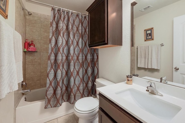 full bath with visible vents, toilet, tile patterned floors, shower / bathtub combination with curtain, and vanity