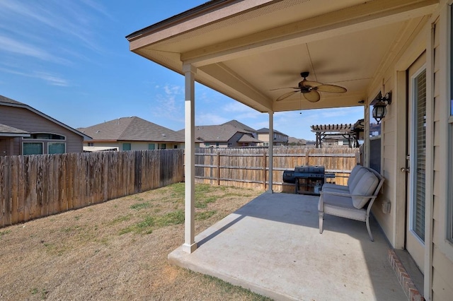 view of patio / terrace featuring ceiling fan, a fenced backyard, and a grill