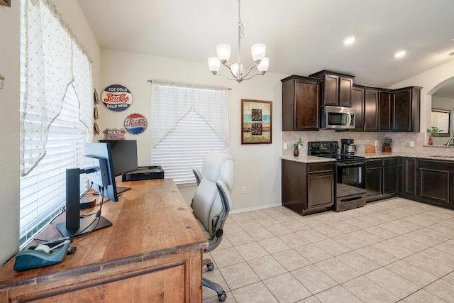 kitchen featuring lofted ceiling, stainless steel microwave, black electric range oven, dark brown cabinets, and backsplash