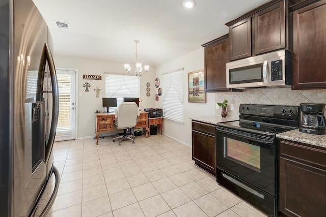 kitchen featuring light tile patterned floors, visible vents, appliances with stainless steel finishes, dark brown cabinets, and backsplash