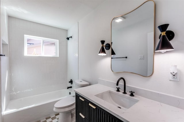 full bathroom featuring washtub / shower combination, vanity, and toilet