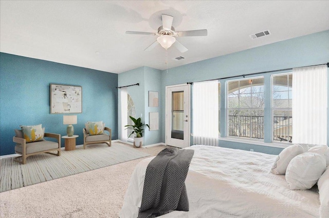 bedroom with a ceiling fan, carpet, visible vents, and baseboards