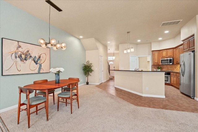 dining space with light tile patterned floors, recessed lighting, light colored carpet, visible vents, and baseboards